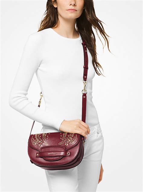 michael kors cary medium grommeted leather saddle bag|Michael Kors saddle crossbody bag.